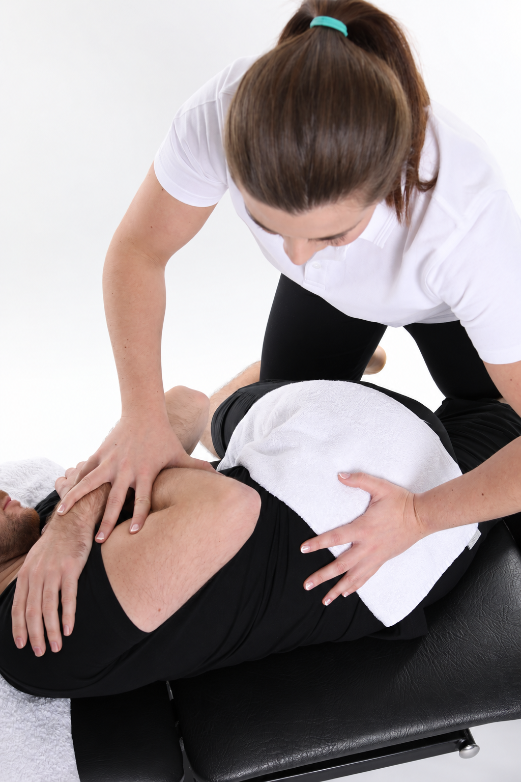 Side-lying lumbar spinal manipulation
